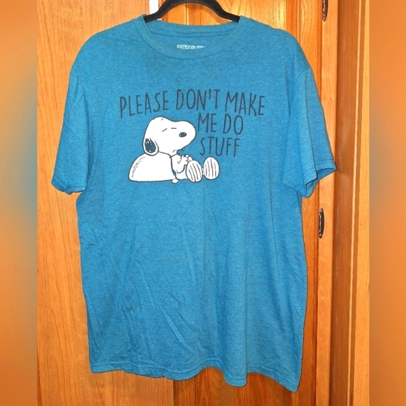 A Peanuts Snoopy short sleeve t-shirt in a size adult large. - Picture 1 of 5